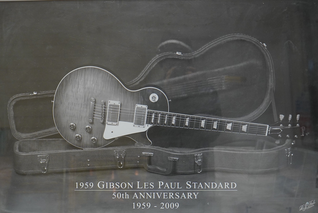 A limited edition 50th anniversary poster of the 1959 Gibson Les Paul standard guitar, 1959-2009, with certificate to the reverse limited edition 16/500, framed, 59 x 89cm